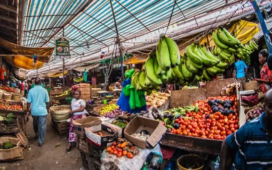 Market close-up in Kenya with bananas and fruits