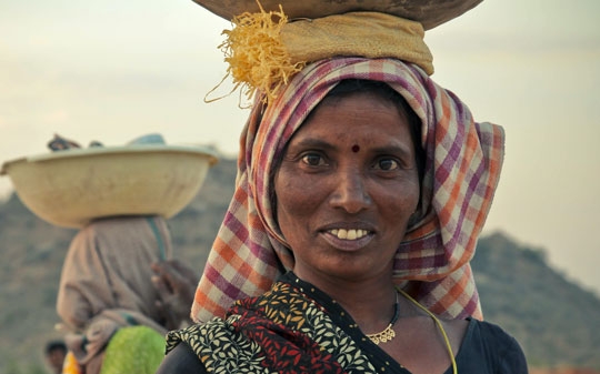 Woman in India looking at the camera and smiling