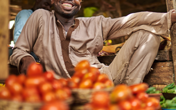 smiling veg vendor