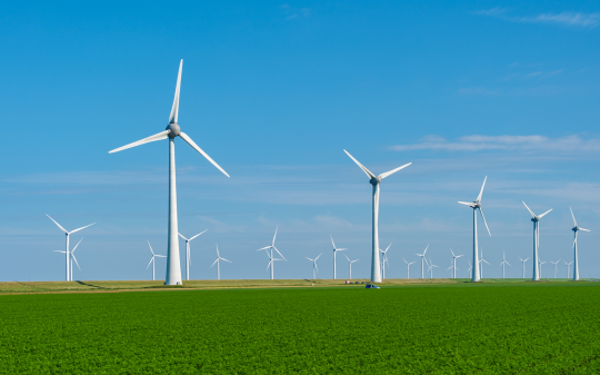 sustainable-wind-power-generation-amidst-lush-field sustainable-wind-power-generation-amidst-lush-field