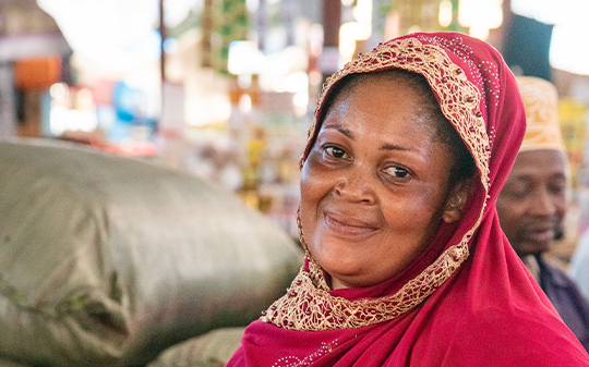 smiling lady in the market